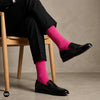 Dynamocks prism pink crew length socks for men and women.