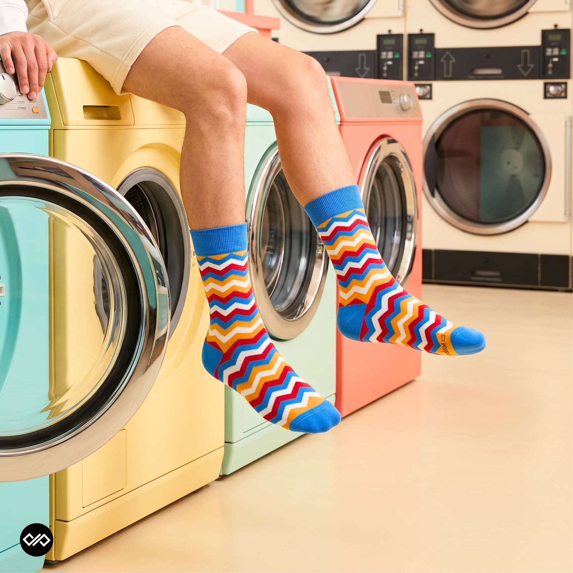 Banger chevron crew socks for men and women styled in laundromat — red, yellow & blue zigzag — Dynamocks