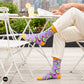 Citrus crew socks on rooftop terrace with cream linen trousers — lavender purple designer cotton crew socks for men and women – Dynamocks