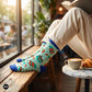 Coffee Cup crew socks styled with cream linen at cafe window – Dynamocks