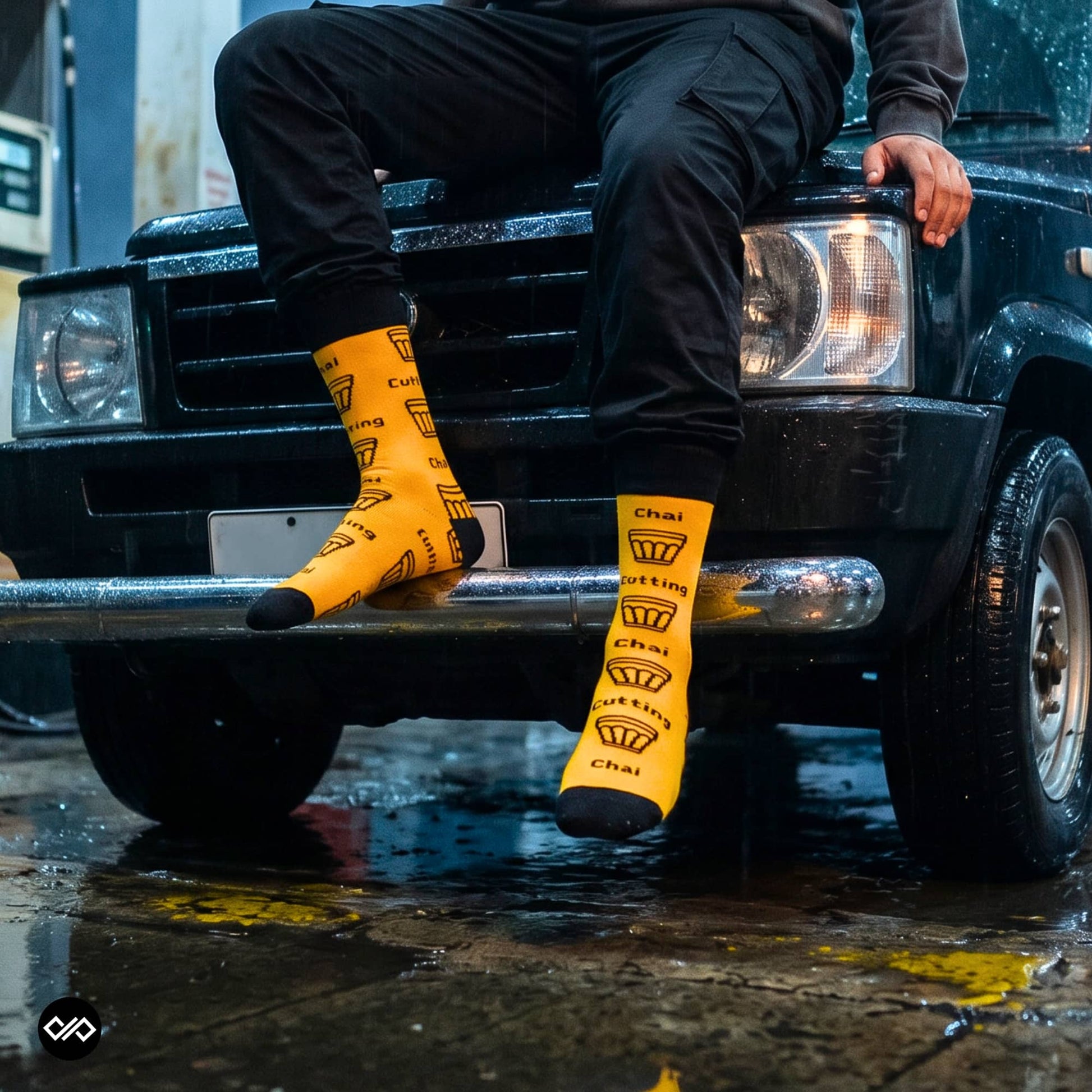 Cutting Chai funky crew socks styled on Mumbai monsoon street — marigold yellow chai design — Dynamocks India