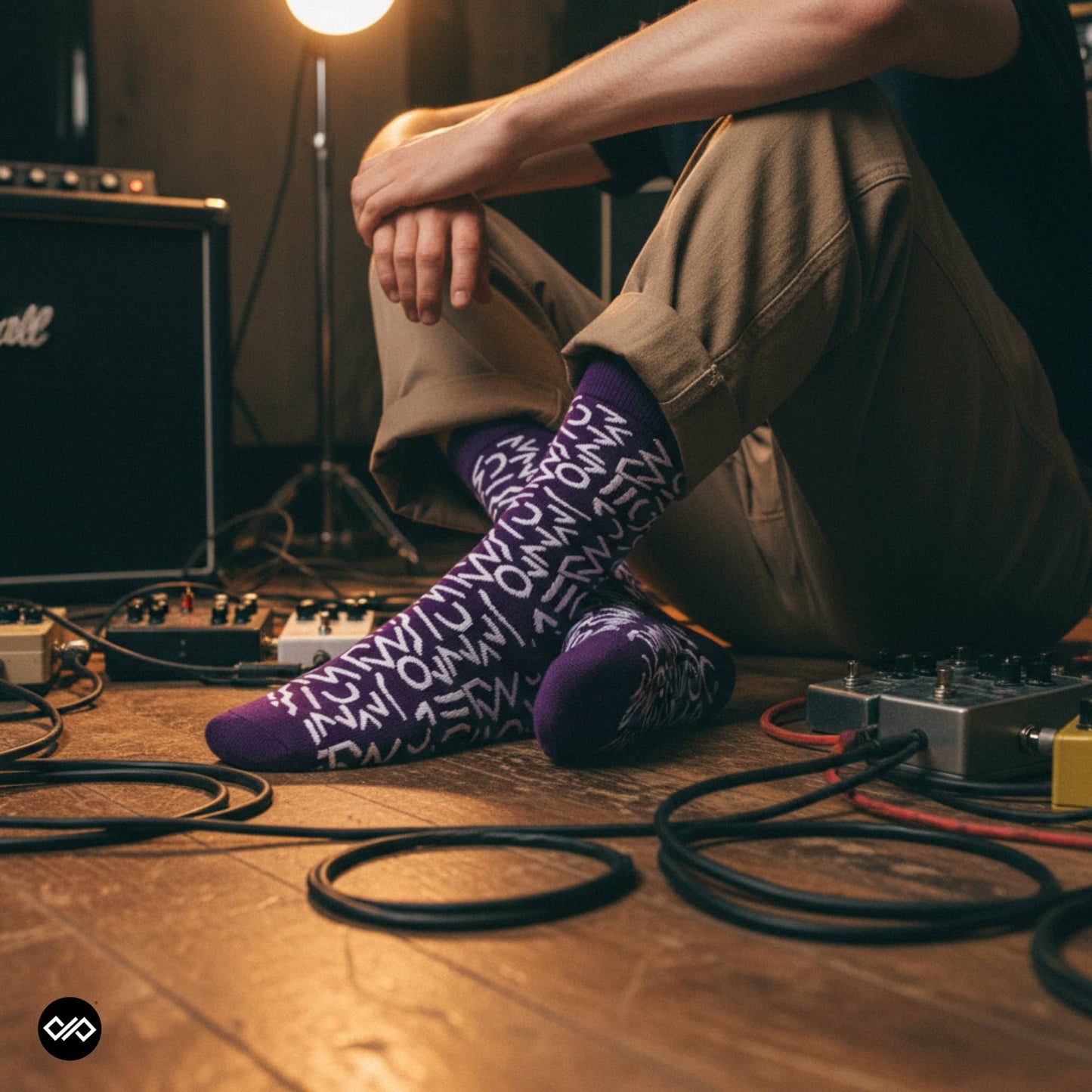Doodle purple crew socks worn in a music studio with guitar pedals — Dynamocks