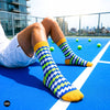 Electro funky crew socks on rooftop tennis court — neon green and blue zigzag echo court colours — Dynamocks India
