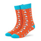 Origami orange and aqua crew socks with white paper plane designs for men and women — Dynamocks - Left Angle