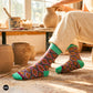Rangoli Indian ethnic crew socks for men styled with cream linen at pottery studio — Dynamocks India