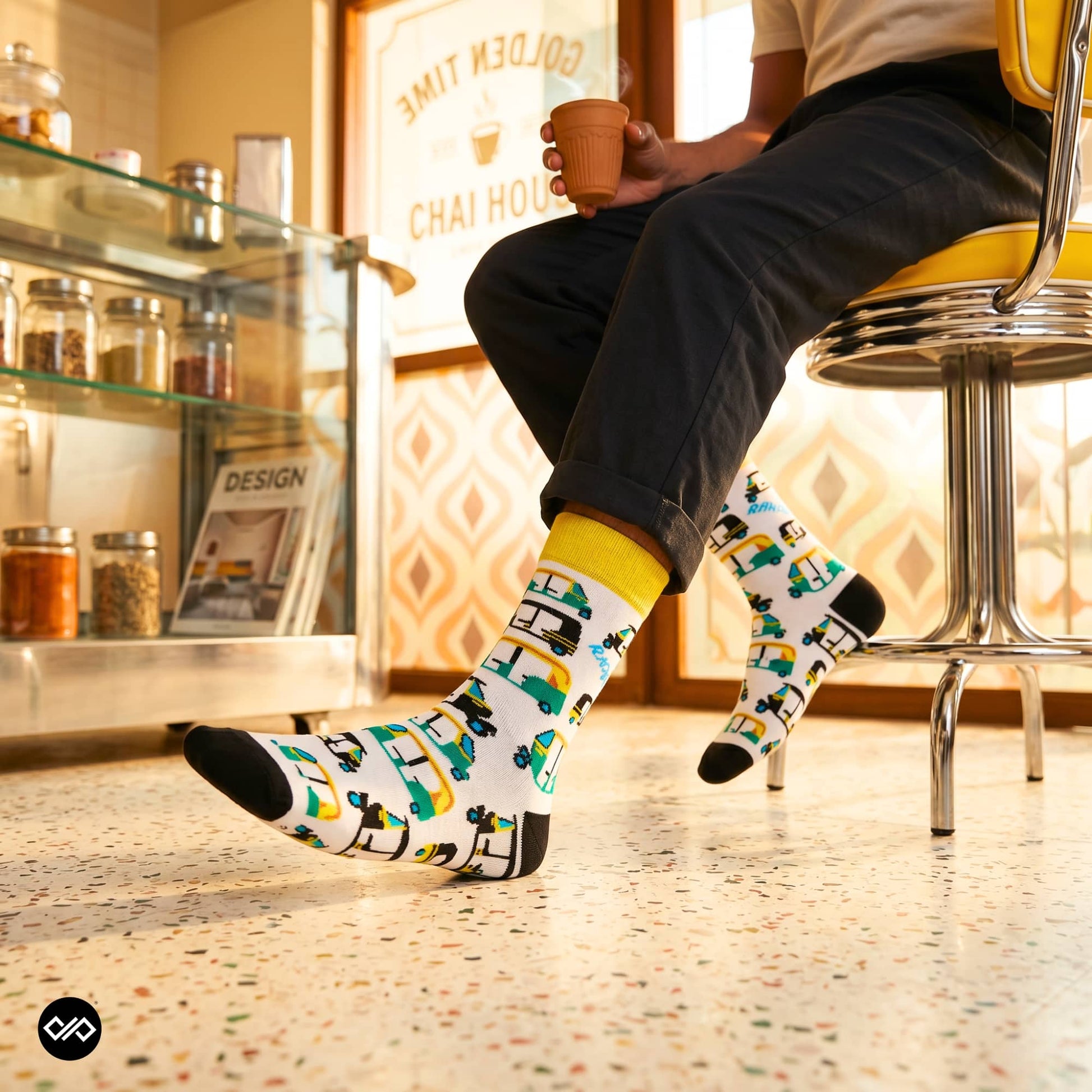Rickshaw Indian crew socks at chai café — auto-rickshaw design on white with yellow cuff — Dynamocks India