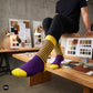 Purple and yellow striped crew socks for women on a designer studio table — premium combed cotton designer socks — Dynamocks
