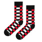 Sublime red check crew socks flat lay — bold red, black and white squares — Dynamocks